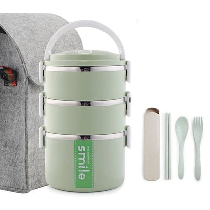 Stainless steel lunch box with built-in spoon, leak-proof design, in green, pink, and blue