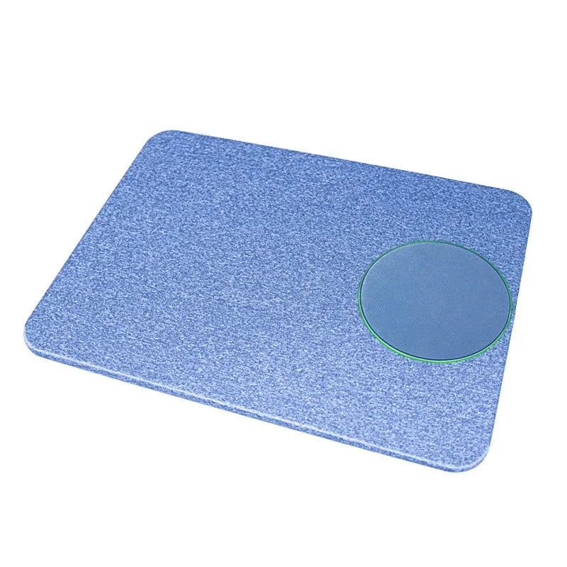 Wireless charging mouse pad in black colour showing cloth surface and charging area for mobile phones