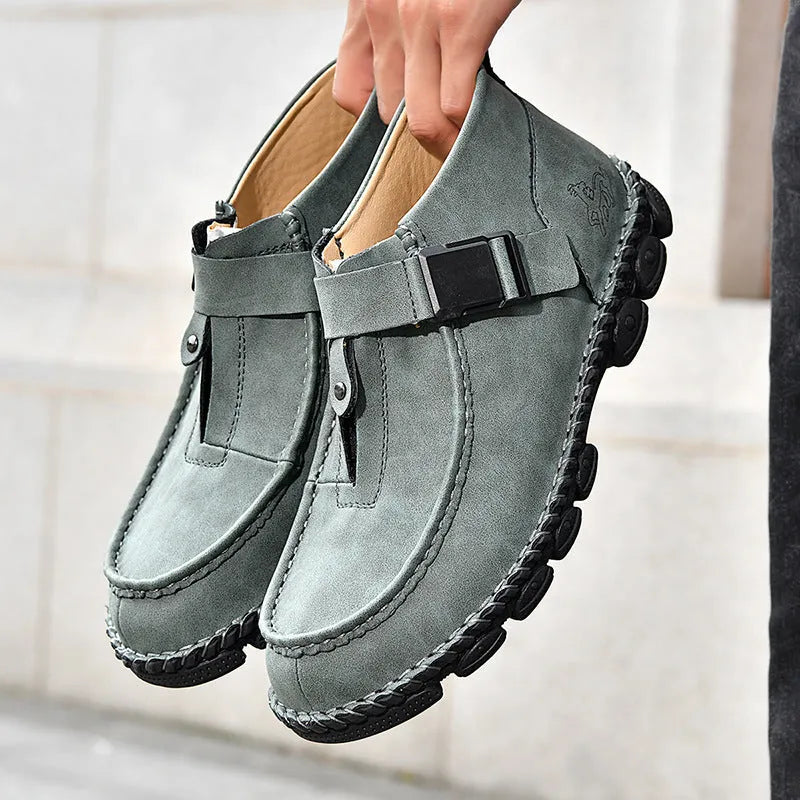 Handmade casual slip-on shoes in synthetic leather with flat bottom and sewing sole construction