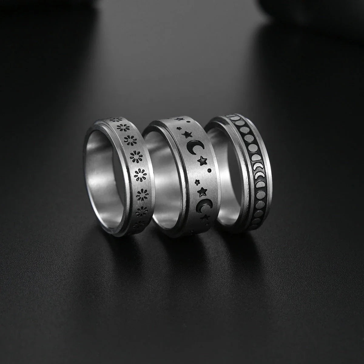 Stylish titanium steel rings with stars, moons, and unique textures for fashionable accessories