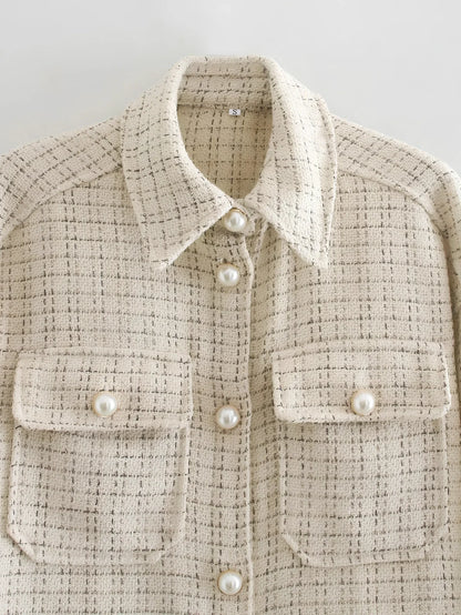 Women's beige plaid thick coat with pearl buttons, long sleeves, lapel collar, and side pockets in size M