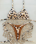 Women's printed bikini swimsuit with briefs style on a mannequin, showing the cotton lining and high elasticity fabric.