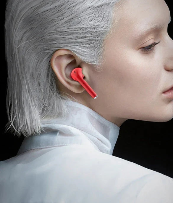 Stylish wireless Bluetooth earbuds with lipstick-inspired design and noise cancellation features