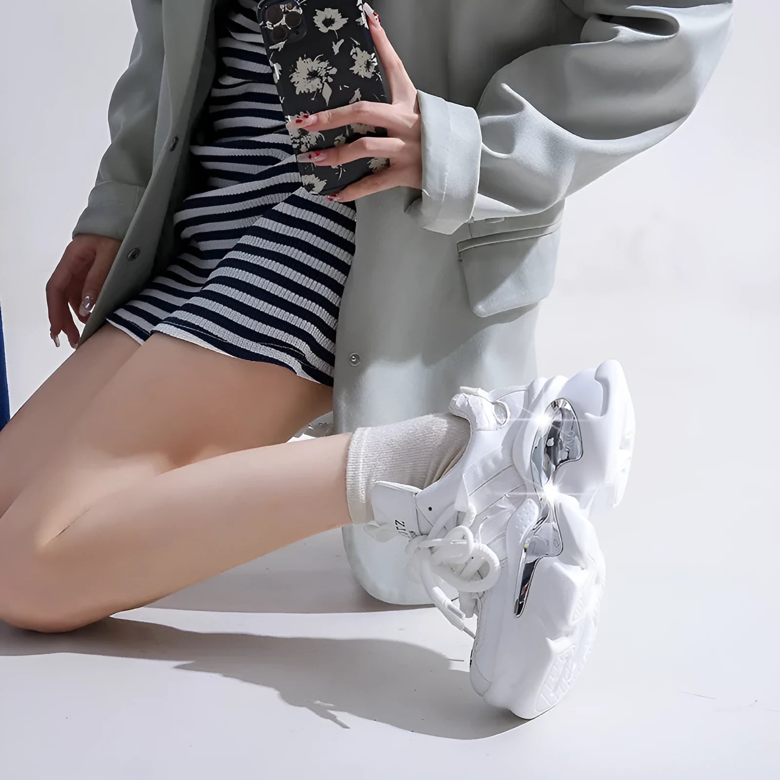 Women's casual platform height increasing sneaker with animal print pattern, mid-top cut, mesh lining, available in several colours