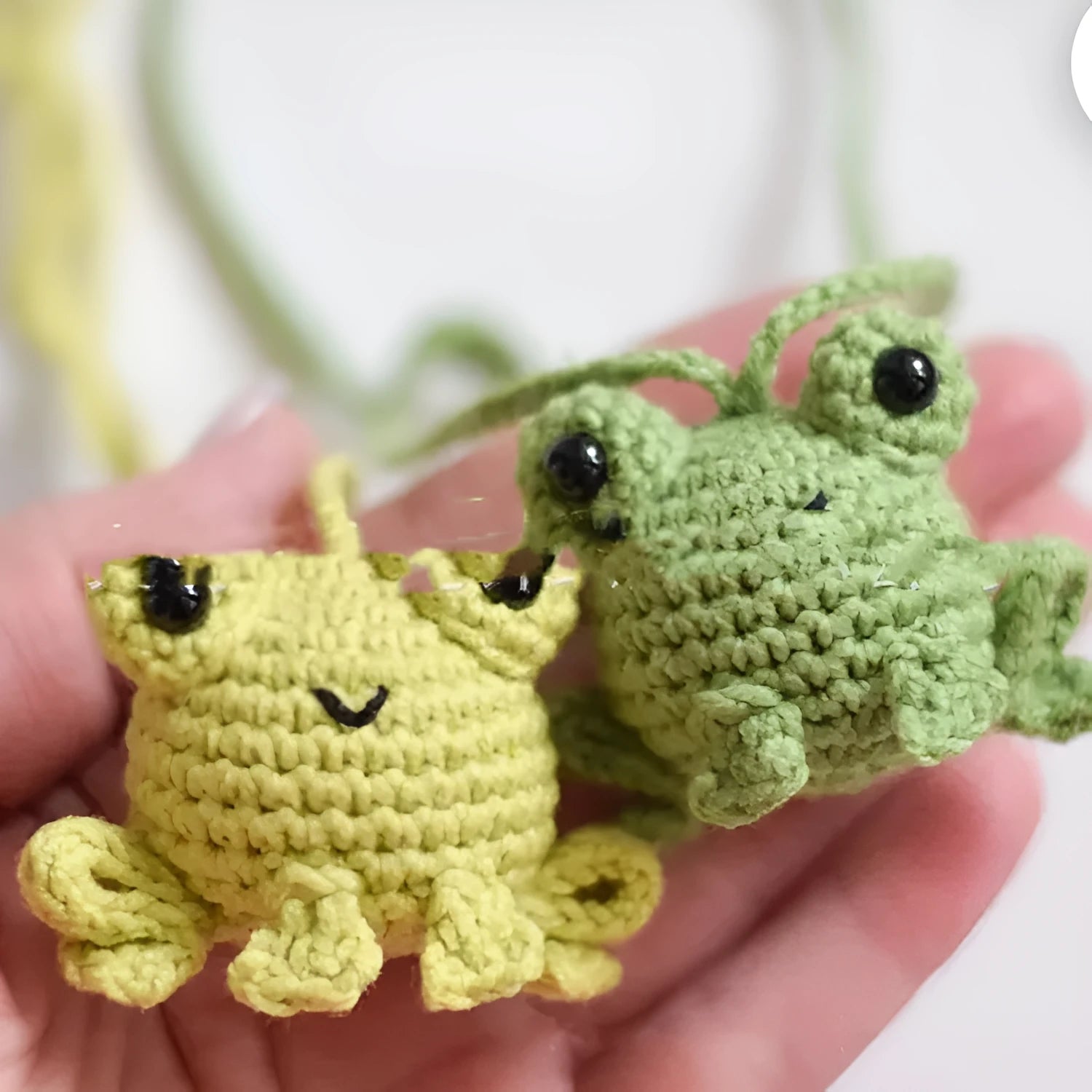 Handmade woven frog car pendant in plush material with cartoon styling