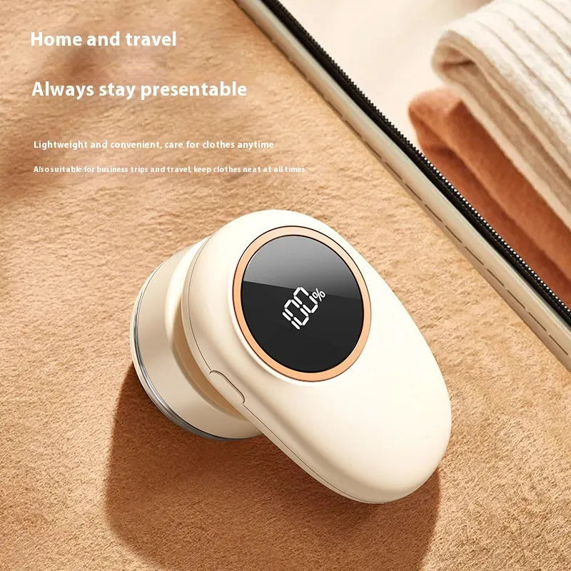 Digital display lint roller and fur ball trimmer in beige or purple with optional cutter heads.