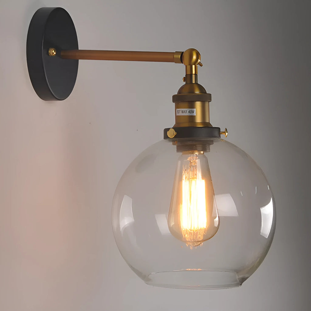 Round retro glass ball wall lamp in amber, smoke grey, or transparent finish with aluminium holder.
