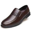 Men's business casual leather shoes with rubber sole, black colour, pointed head style, side view