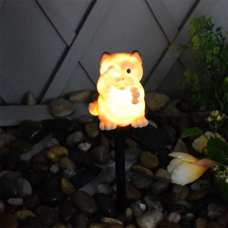 Brown resin cat-shaped solar lawn light for garden pathways