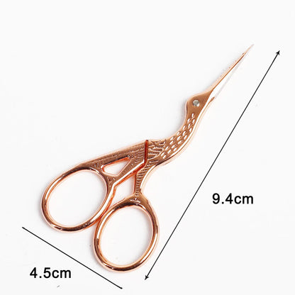 Stainless steel retro scissors in crane shape for precise cutting, available in multiple colours