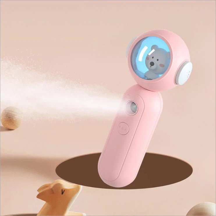 Handheld nano spray steamer in cat pink, cat white, and alien red for skin hydration