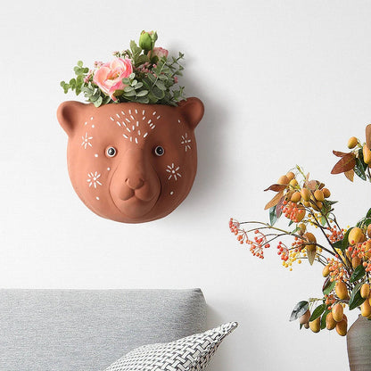 Ceramic animal-shaped wall vases in rabbit, brown bear, and giraffe designs for stylish home decor