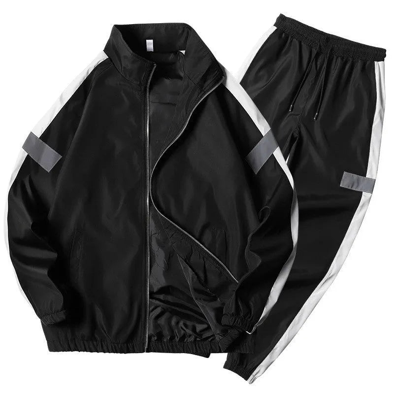 Reflective track suit in black polyester with reflective strips, front view