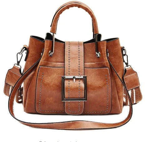 Stylish double-layer cowhide leather bucket bag with chic hardware accents, available in black, pink, and brown colors