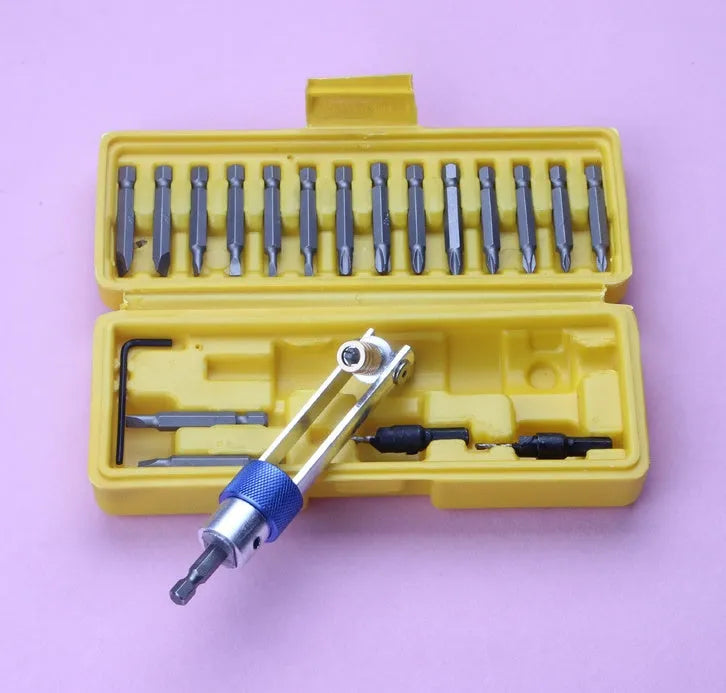 Half Time Drill driver with swivel head and set of Phillips, flathead, and countersink bits.