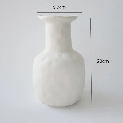 Minimalist ceramic vase set for modern home decoration, perfect for dry flower arrangements.
