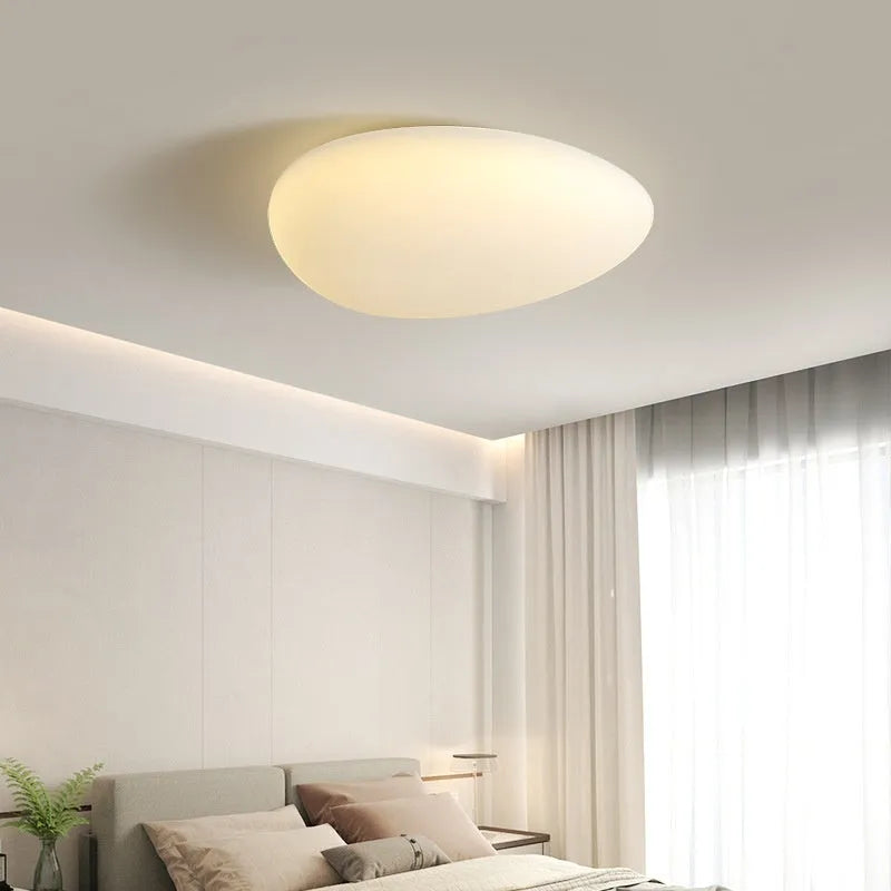 Modern minimalist LED ceiling light in white finish, 23cm diameter, for bedrooms