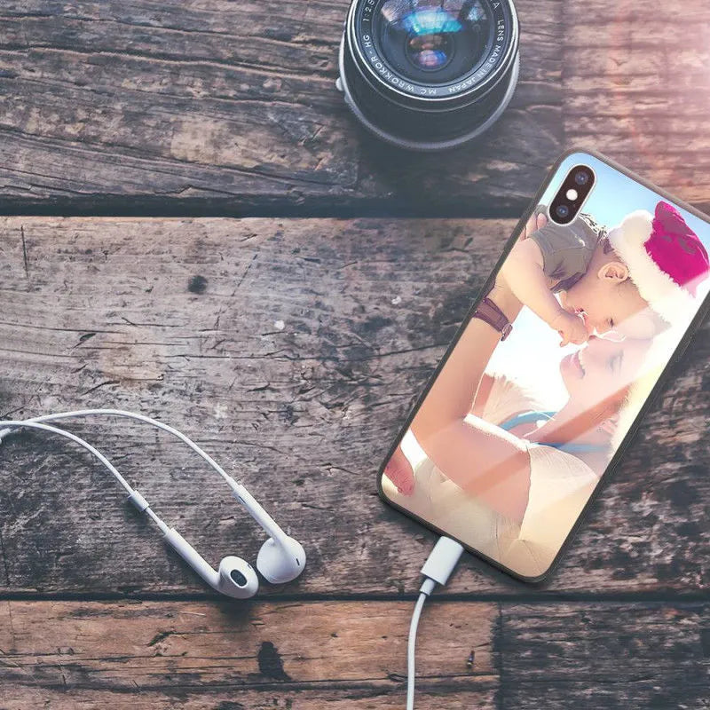 Custom patterned ultra-thin iPhone case with raised bumper edge, shown fitted on an iPhone.