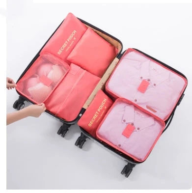 Durable waterproof packing cubes in various colors for organized, efficient travel