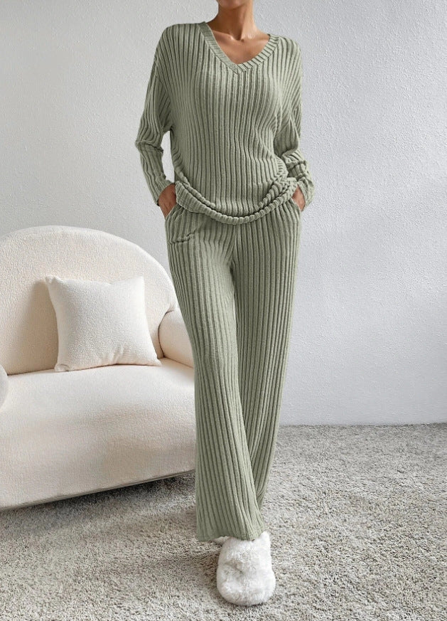 Women's polyester suit set with V-neck top and straight pants in various colours