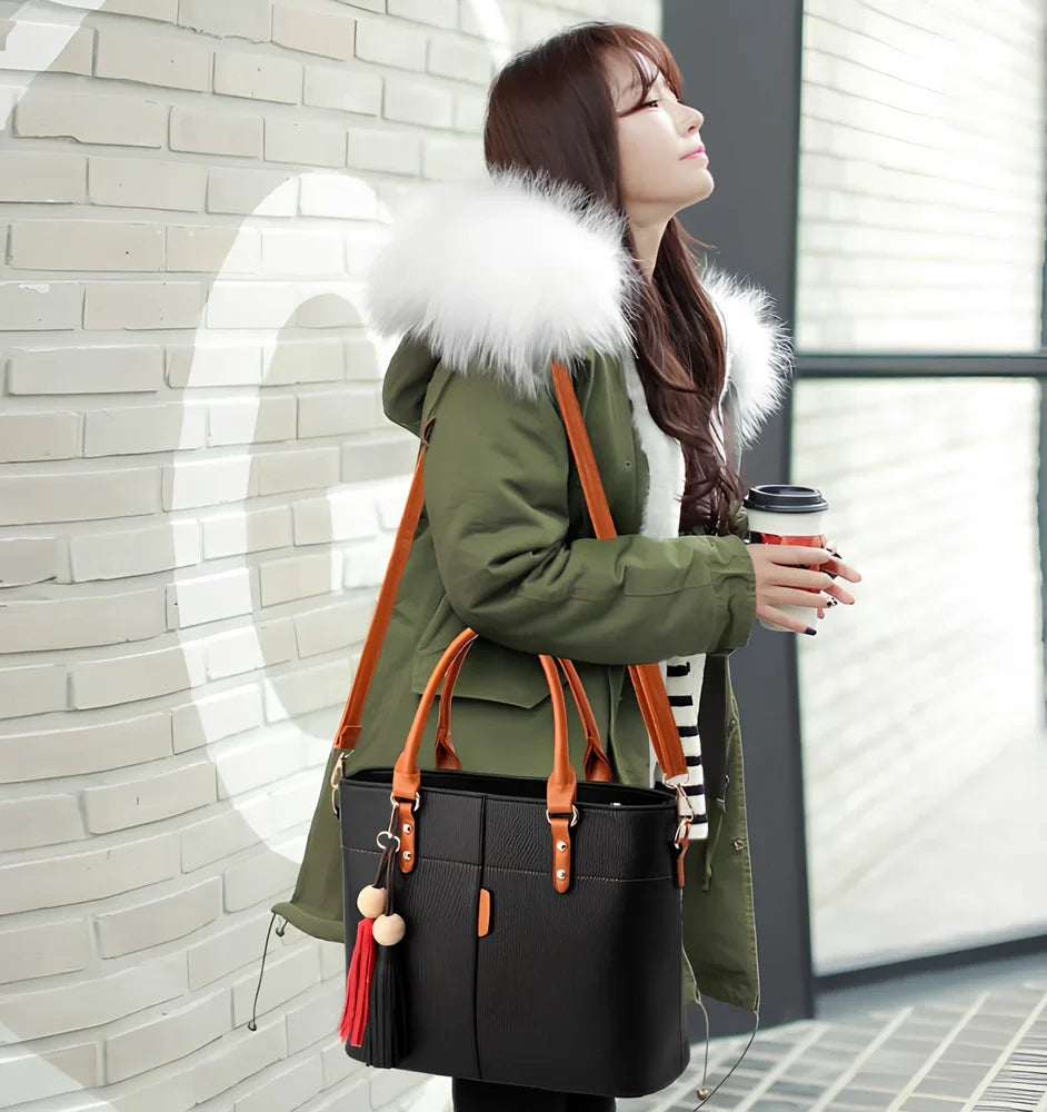 Women's black PU slung shoulder bag, 25cm height, adjustable strap for diagonal carry with phone and wallet inside