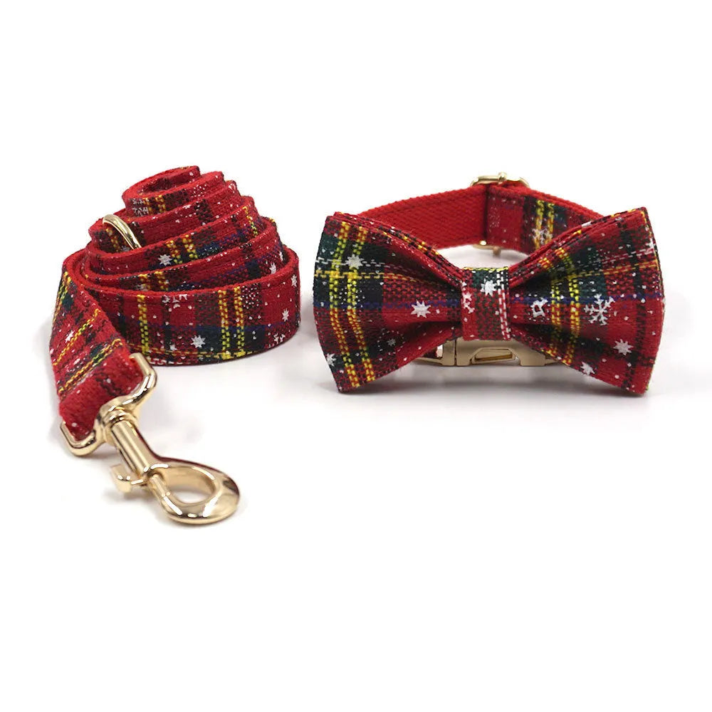 Red cloth Christmas dog collar and harness set with matching bow tie and waste bag holder on size tag
