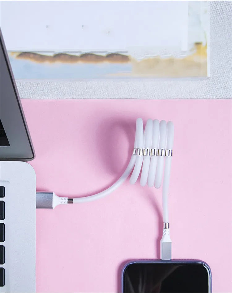 Black magnetic charging cable with Apple, Android, and Type-C compatibility showing aluminium alloy joints