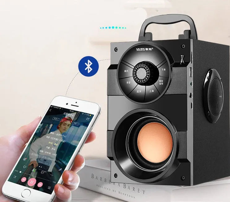 Black portable mini audio system with subwoofer and 3.5mm connection cable