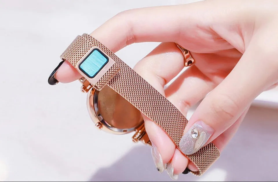 Starry Sky women's watch with magnetic mesh strap, alloy case, and glass surface, 34mm diameter