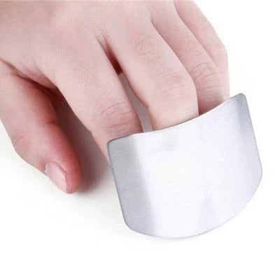 Stainless steel finger guard for safe vegetable cutting, available in single and double finger sizes