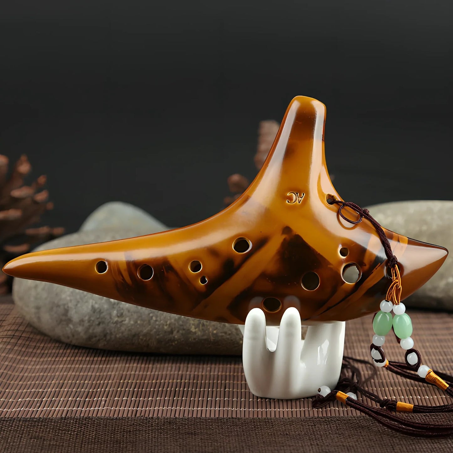 Yellow 12-hole ceramic ocarina in Alto C with 13-note range and integrated lanyard
