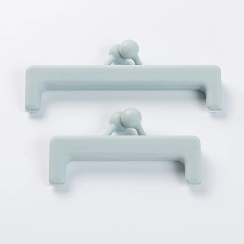 Push-button plain food bag sealing clips in blue and pink