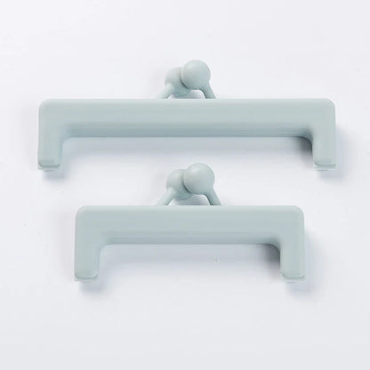 Push-button plain food bag sealing clips in blue and pink