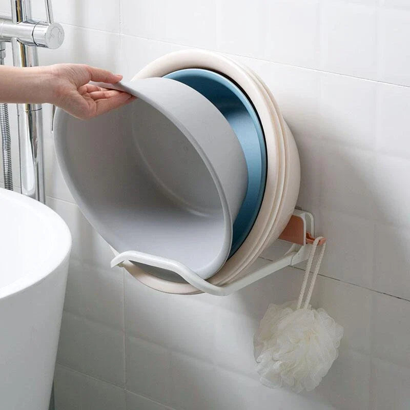 Folding storage rack with non-marking stickers in pink, blue, and grey