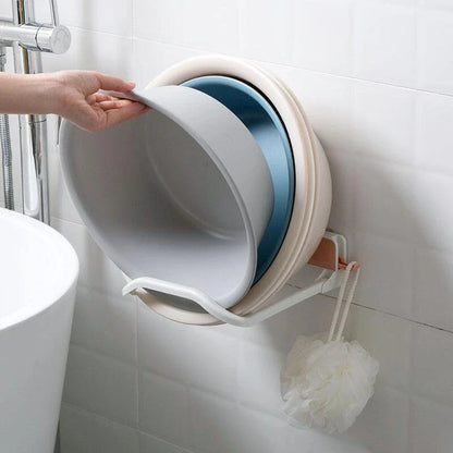 Folding storage rack with non-marking stickers in pink, blue, and grey