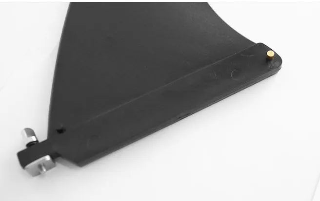 SUP paddle with large removable fish fins showing plastic construction and detachable components