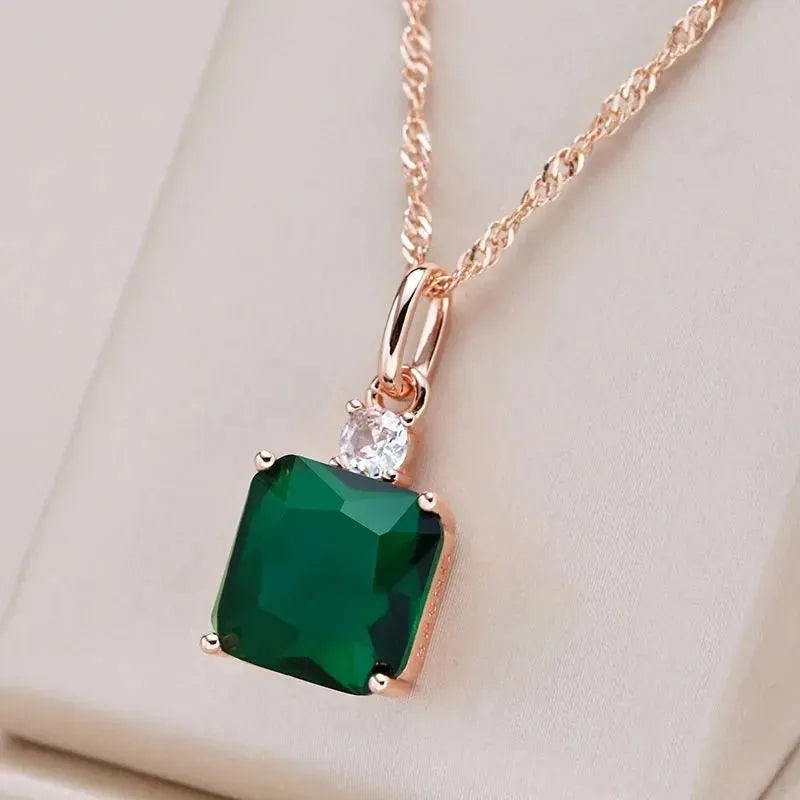 Green electroplated stainless steel clavicle chain with geometric quadrilateral pendant on O-ring chain