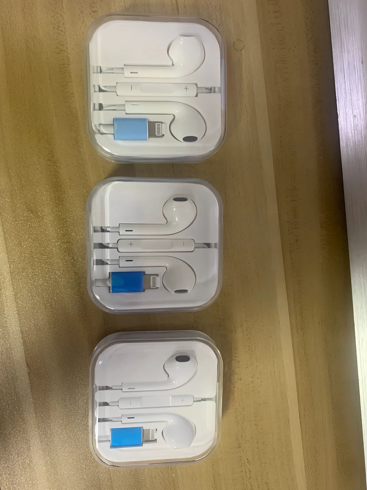 Automatic pop-up Bluetooth headset with lightning plug and in-ear design for wireless audio