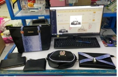 Elegant women's shoulder bag with zipper and organised pocket in light grey, black, off-white, and rose red