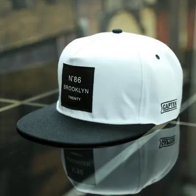 Adjustable cotton polyester baseball cap with short brim and curved eaves in black dome top style