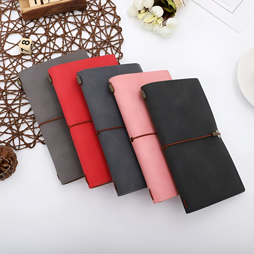 A6 cowhide rope style diary notebook in grey, pink, or red with imitation leather cover.