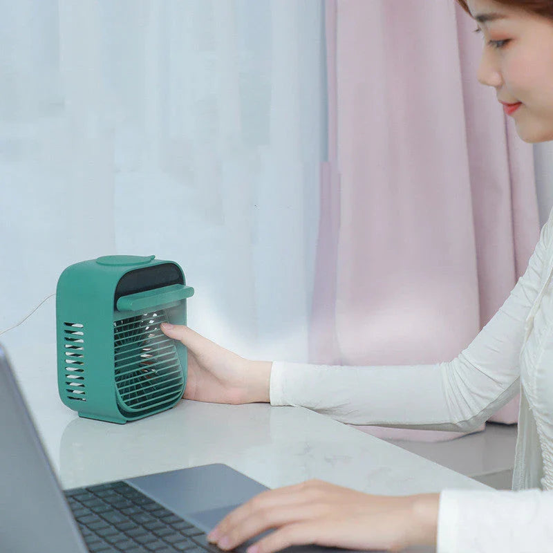Desktop air conditioner fan with water spray feature in green