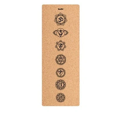 Cork yoga mat showing asana guide lines pattern with 183cm length and natural texture surface