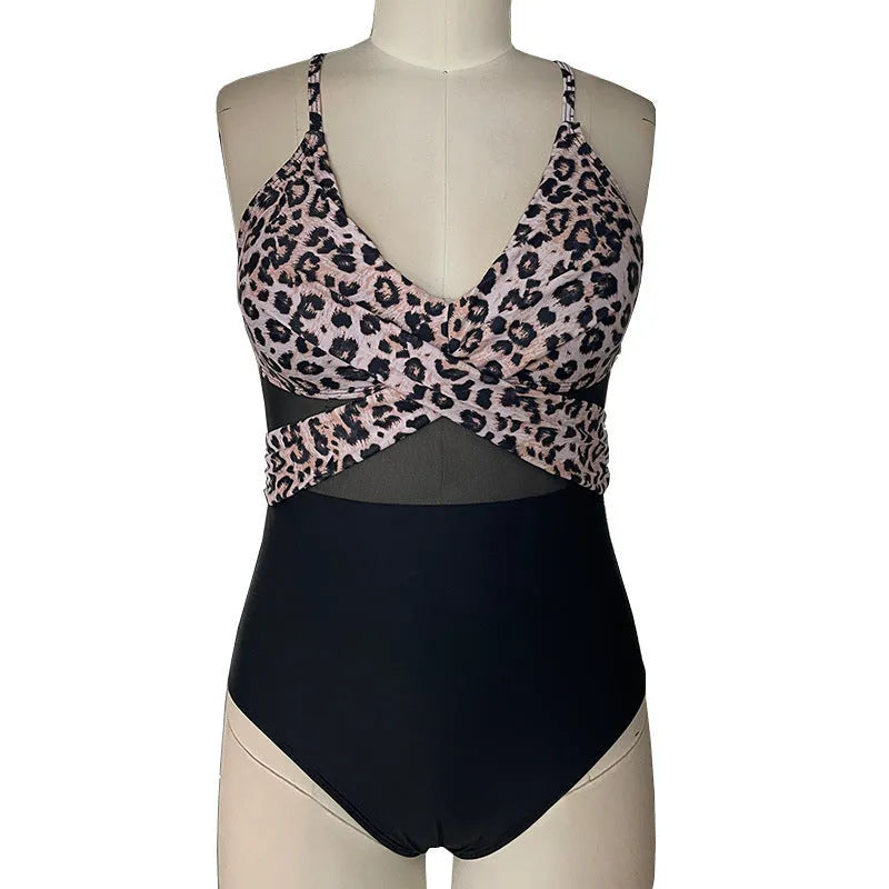 Women's mesh spliced backless one-piece swimsuit in solid black colour, polyester lined