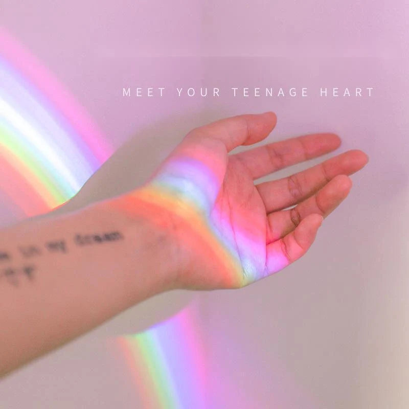 Colorful rainbow projection lamp with USB charging, perfect for kids' rooms