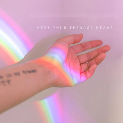 Colorful rainbow projection lamp with USB charging, perfect for kids' rooms