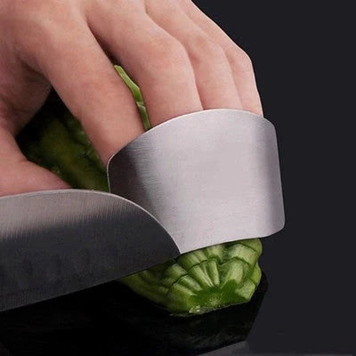 Stainless steel finger guard for safe vegetable cutting, available in single and double finger sizes