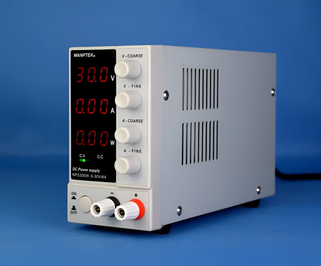 White NPS605W adjustable DC bench power supply with voltage and current dials for electronics repair.