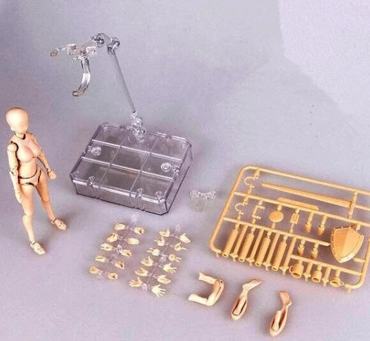 Articulated human mannequin kits for artists with interchangeable accessories