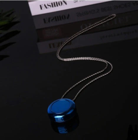 Portable negative ion air purifier necklace in blue, white, and silver options